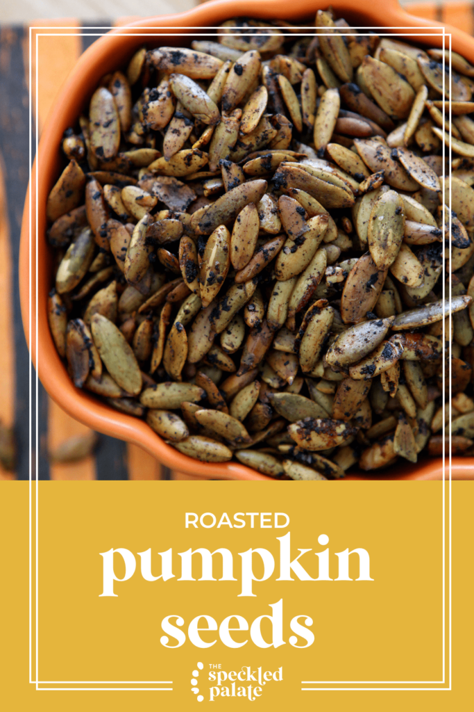 A bowl of pumpkin seeds with the text roasted pumpkin seeds