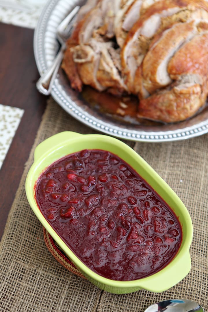 Yellow dish filled with cranberry chutney 