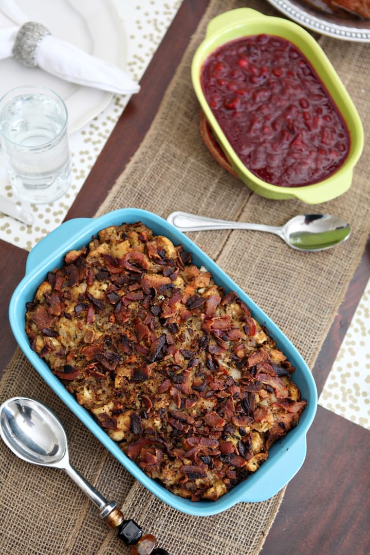 Overhead view of stuffing in blue dish on wood board 