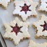 Snowflake-shaped Raspberry Linzer Cookies