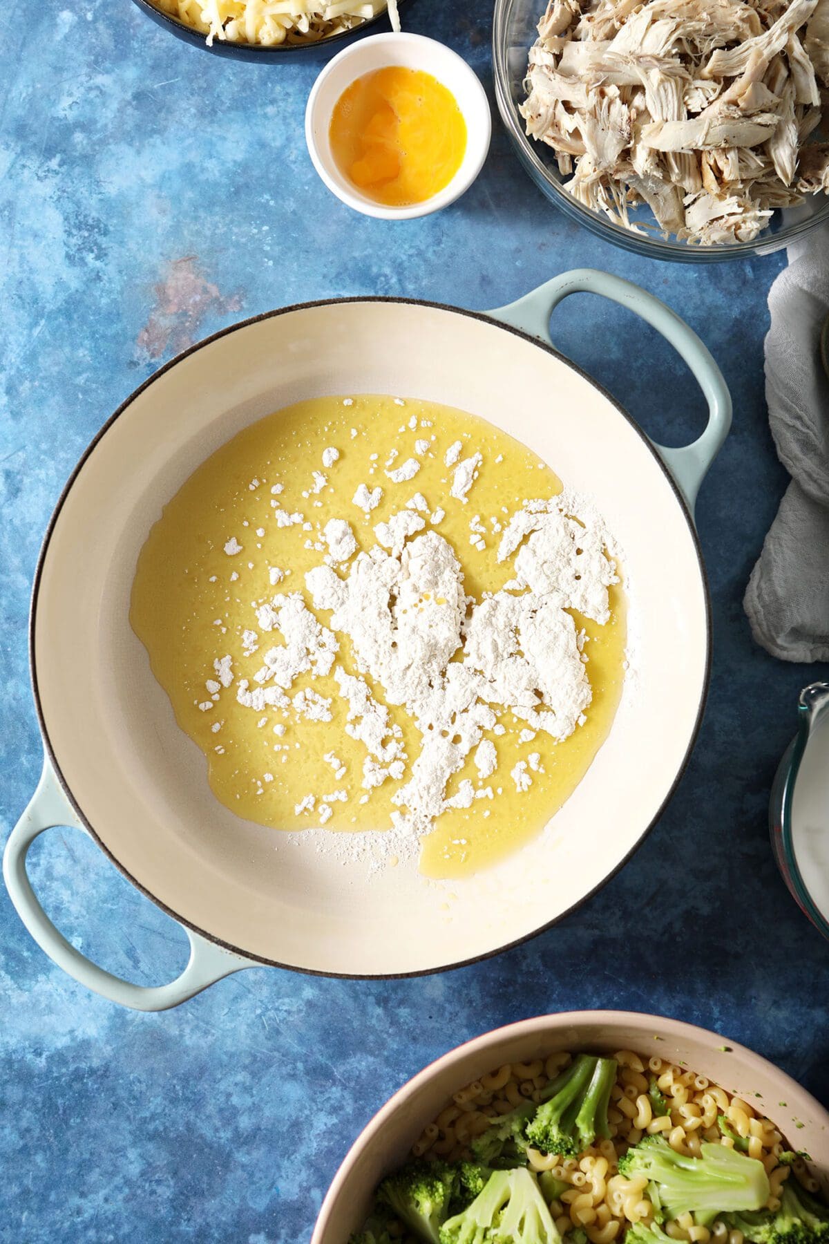 Oil and flour in a skillet to make a roux for Mac n cheese