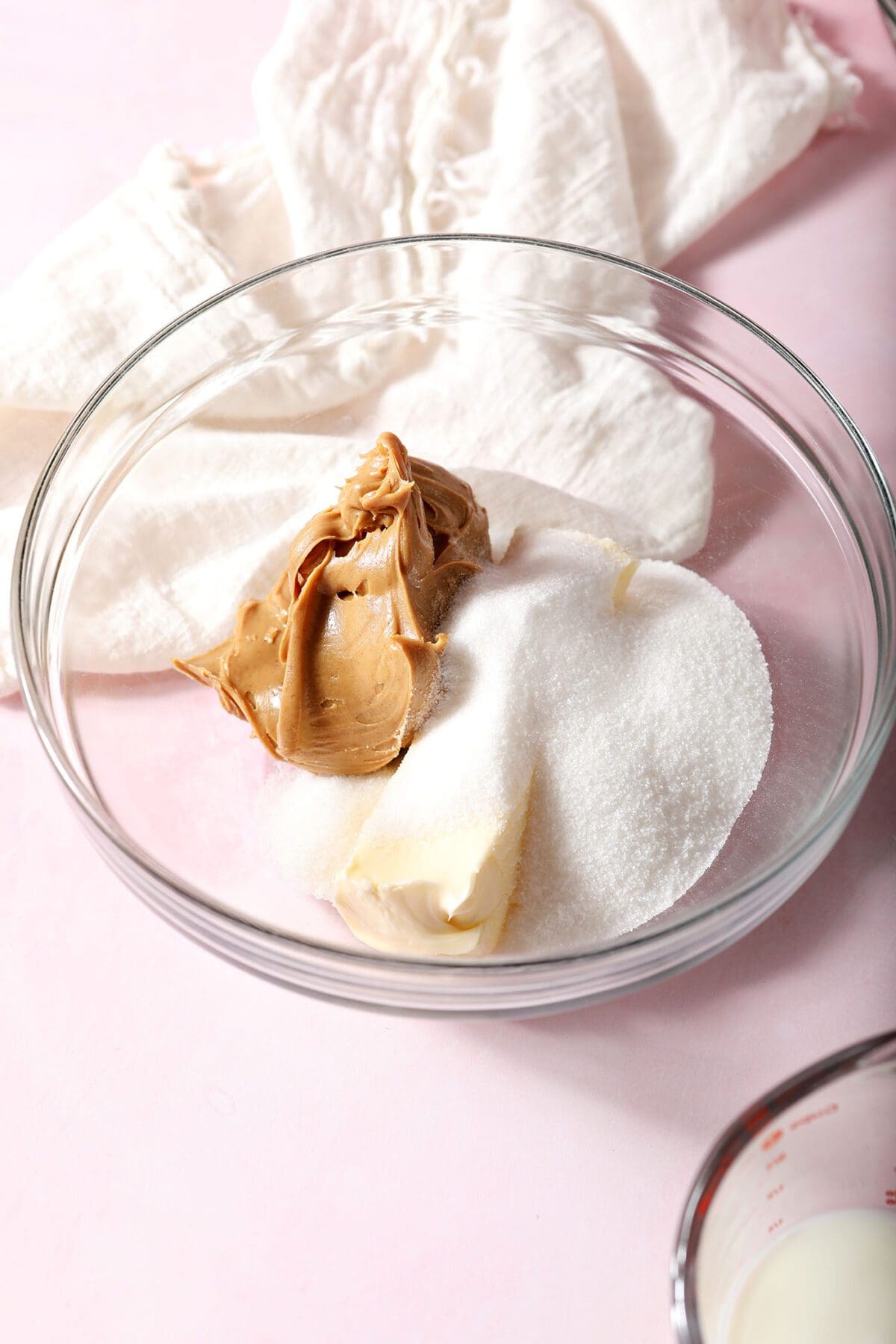 Peanut butter, softened butter and sugar in a bowl