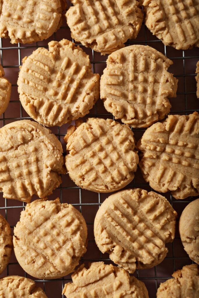 Peanut butter shortbread cookies on a cooling rack