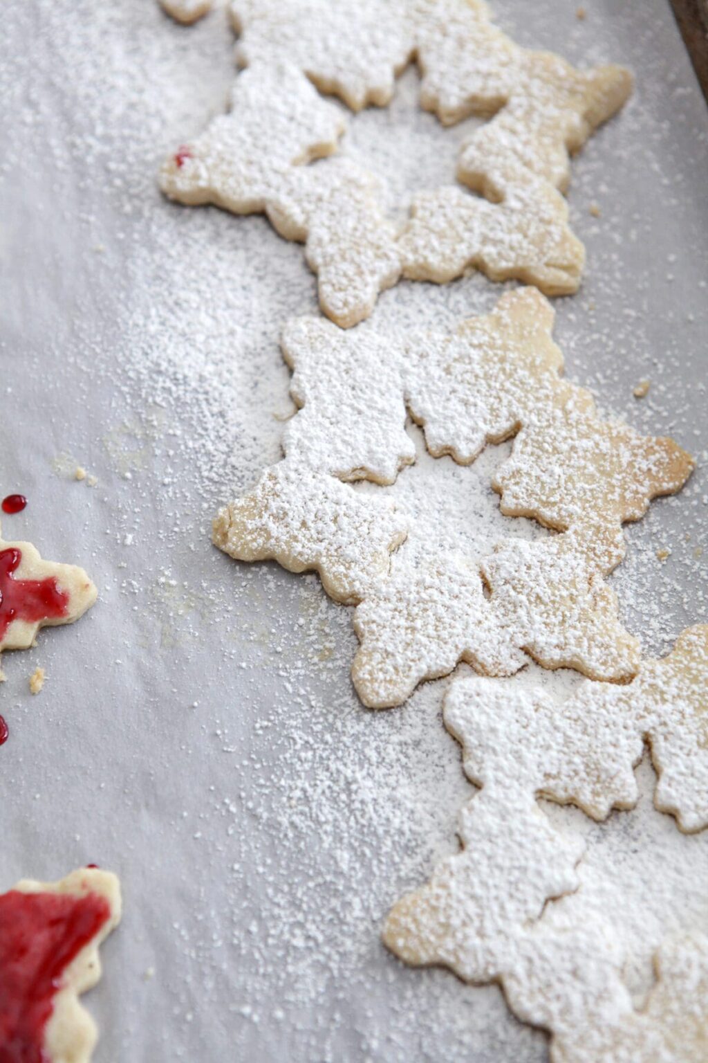 Snowflake-shaped Raspberry Linzer Cookies