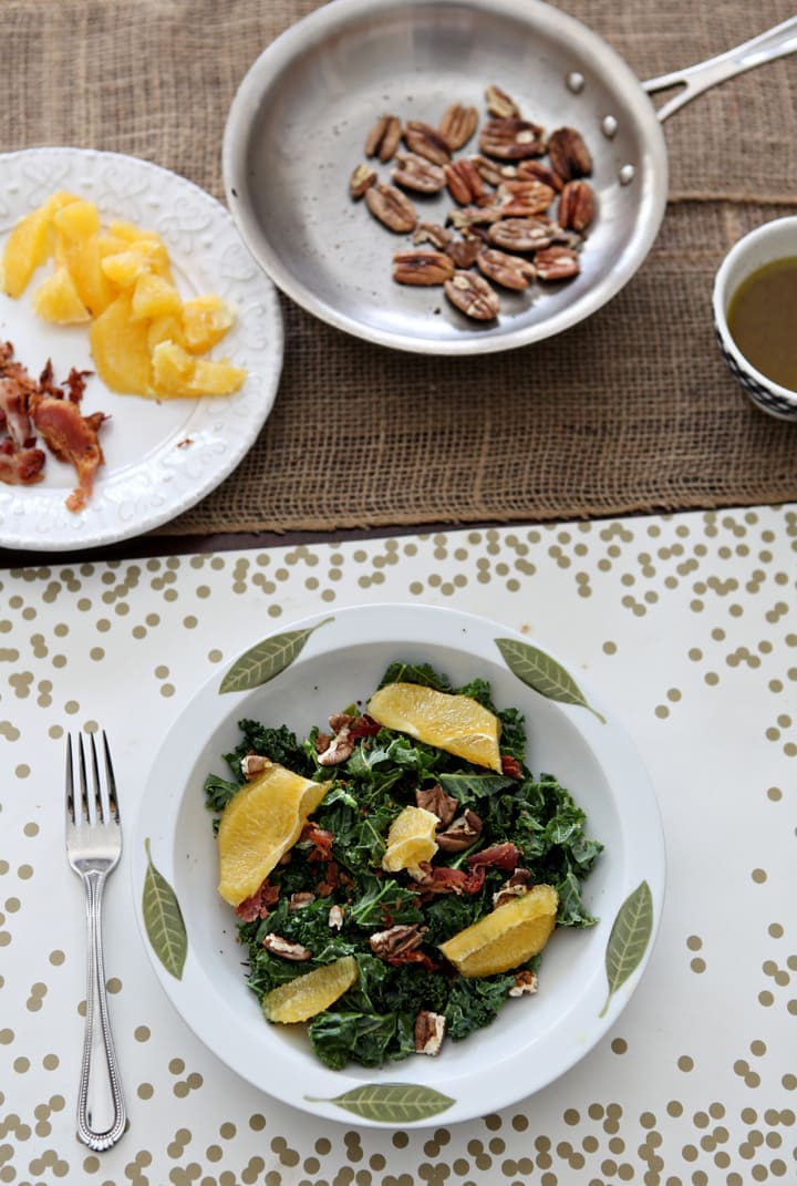 Start off the new year with a healthy Mandarin Kale Salad, made with fresh mandarin oranges, kale, toasted pecans, bacon and an orange vinaigrette.