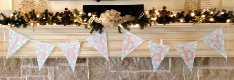 Decorative banner hanging over mantel 