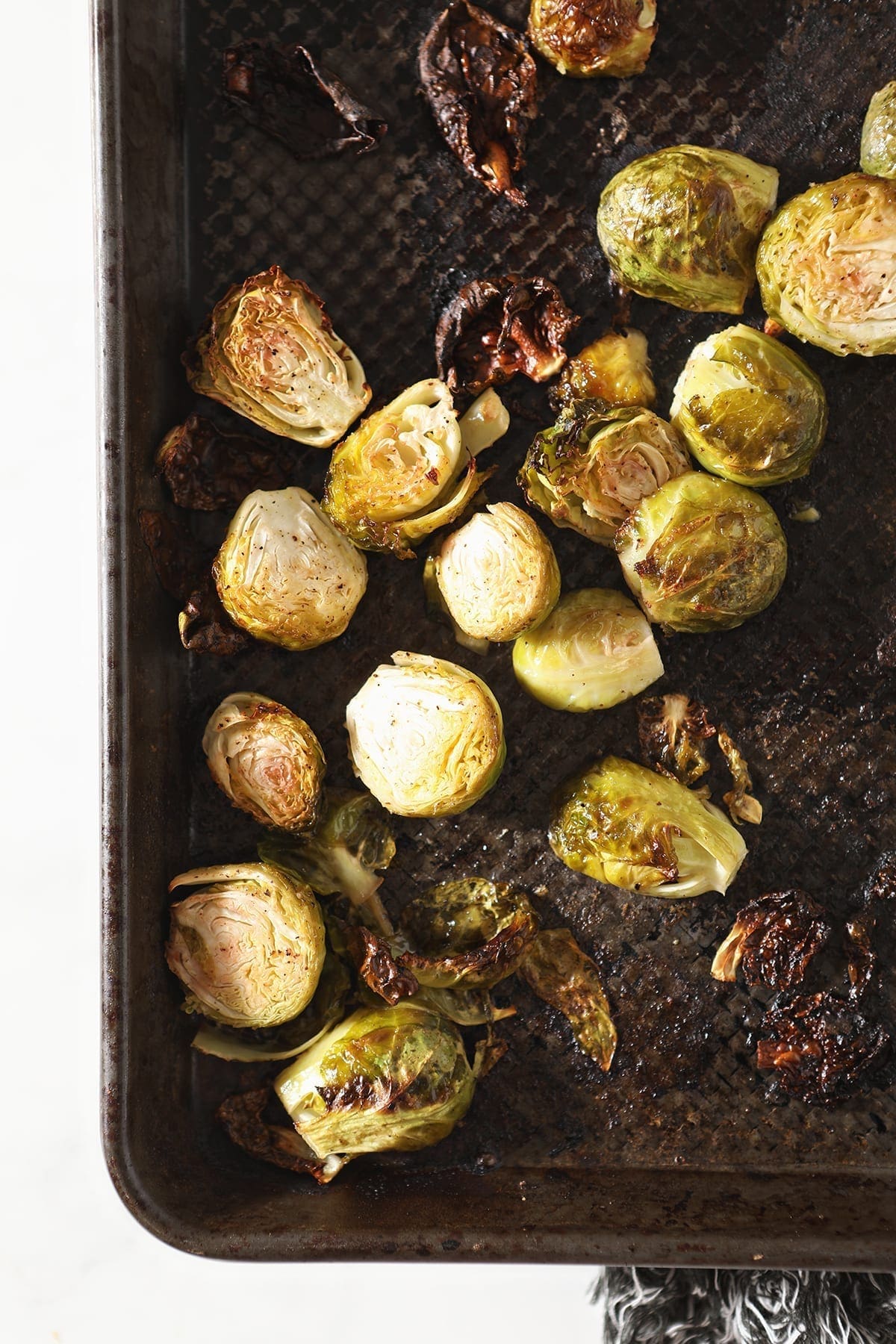 Brussels sprouts on a baking sheet after baking