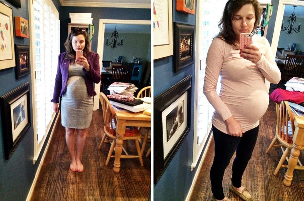 A woman standing in front of mirror taking a picture with her phone 