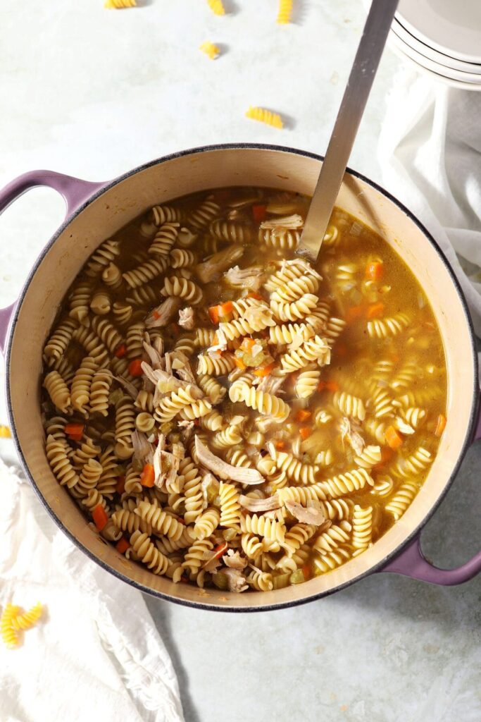 Chicken noodle soup in a large Dutch oven