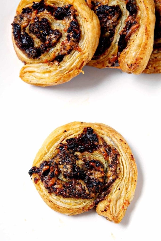 Overhead image of Bruschetta and Pesto Sun-Dried Tomato Pinwheels 