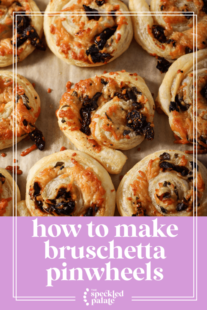 Bruschetta puff pastry pinwheels on a sheet pan after baking with the text how to make bruschetta pinwheels