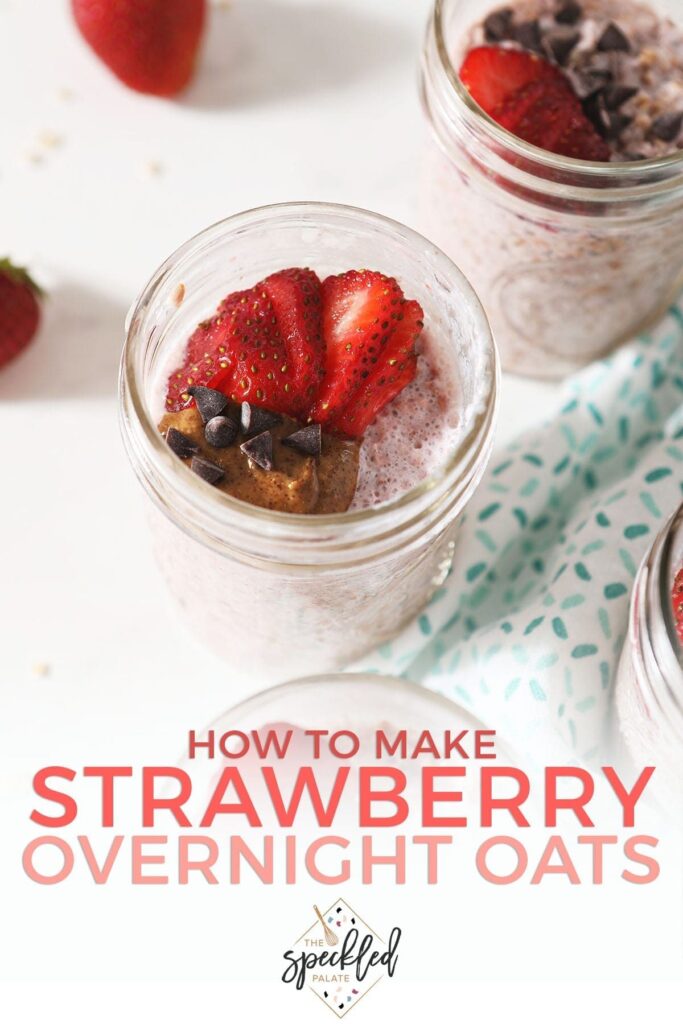 Close up of strawberry overnight oats in a mason jar garnished with almond butter, chocolate chips and sliced strawberries with the text 'how to make strawberry overnight oats'