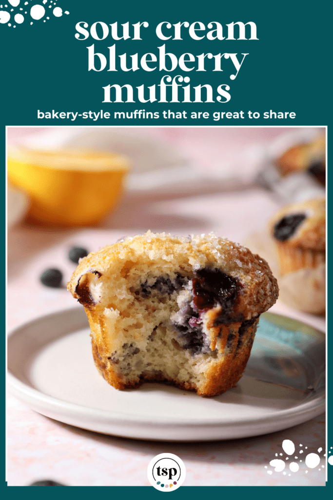 Close up of a Blueberry Muffin on a plate with the text sour cream blueberry muffins bakery-style muffins that are great to share