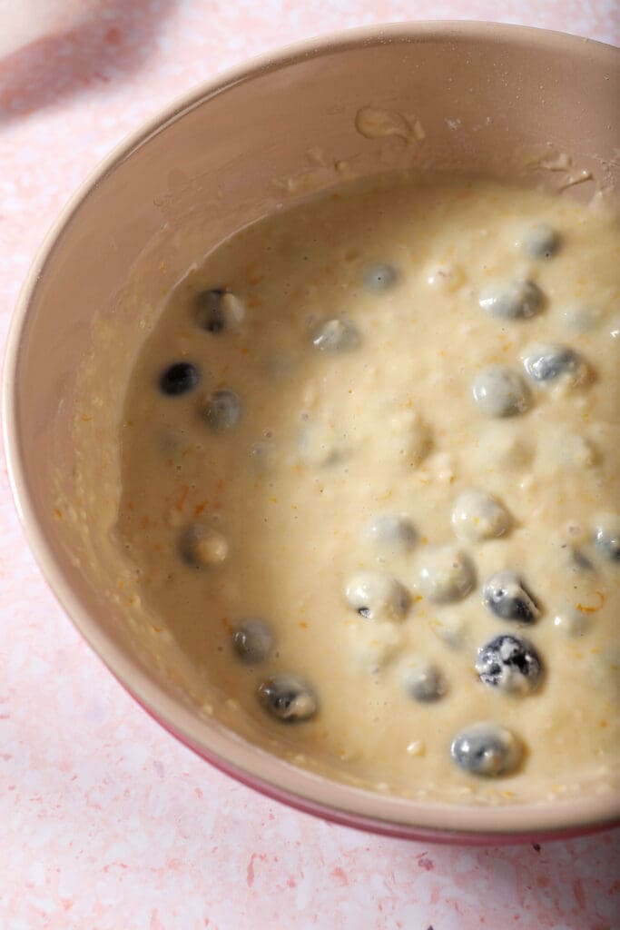 Close up of Sour Cream Blueberry Muffin batter in a bowl