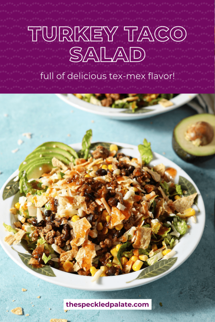 A white bowl of taco salad with the text turkey taco salad full of delicious texmex flavor