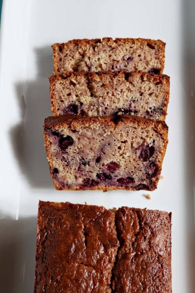 Slices of pound cake on a white platter, before serving