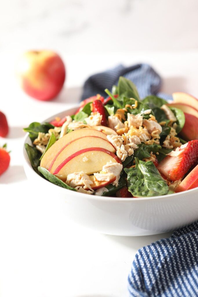 A bowl of chicken apple salad