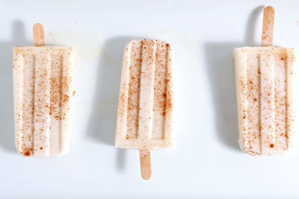 Three Spiced Rum Horchata Pops on a white plate