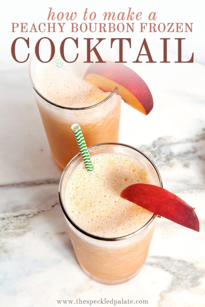 Two glasses holding frothy orange liquid inside on a marble countertop with peach wedge garnishes and green straws with the text "how to make a peachy bourbon frozen cocktail"