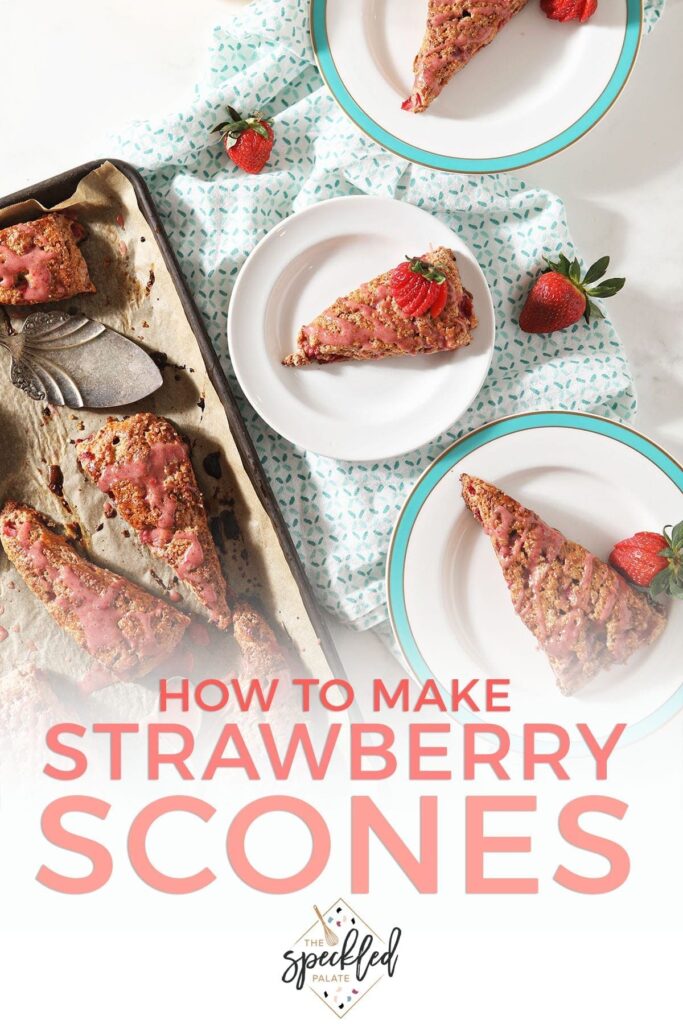 Three plates hold strawberry scones next to a baking sheet with more scones on it with the text 'how to make strawberry scones'