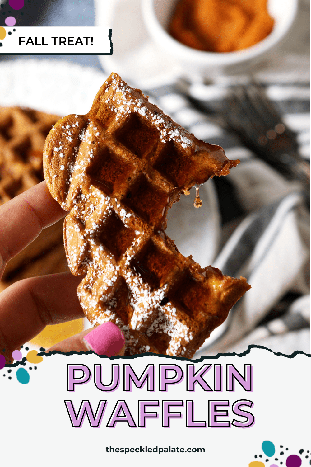 a hand holds a bitten-into waffle covered in syrup next to a plate of more waffles with the text pumpkin waffles