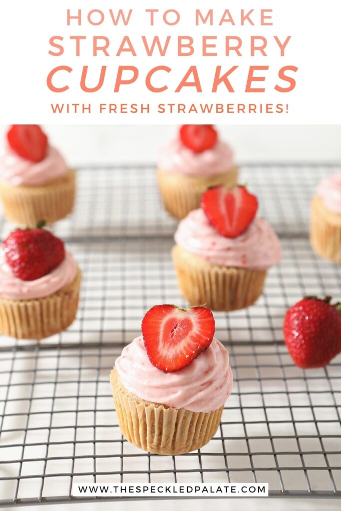 Decorated Strawberry Cupcakes on a wire cooling rack with the text 'how to make strawberry cupcakes with fresh strawberries'