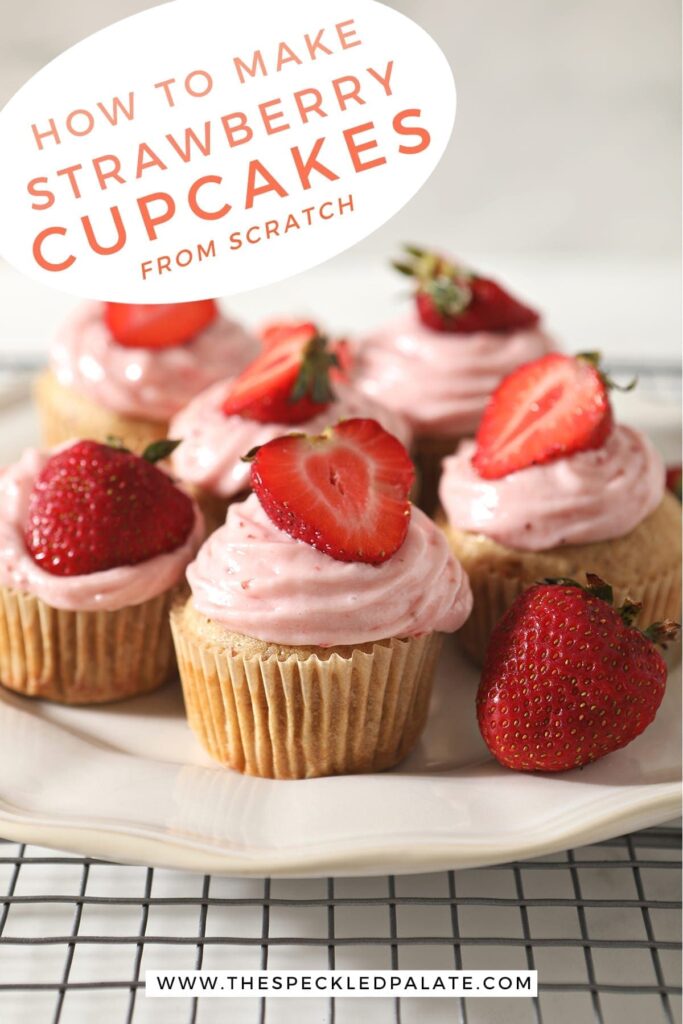 Decorated Strawberry Cupcakes on a white platter with the text 'how to make strawberry cupcakes from scratch'