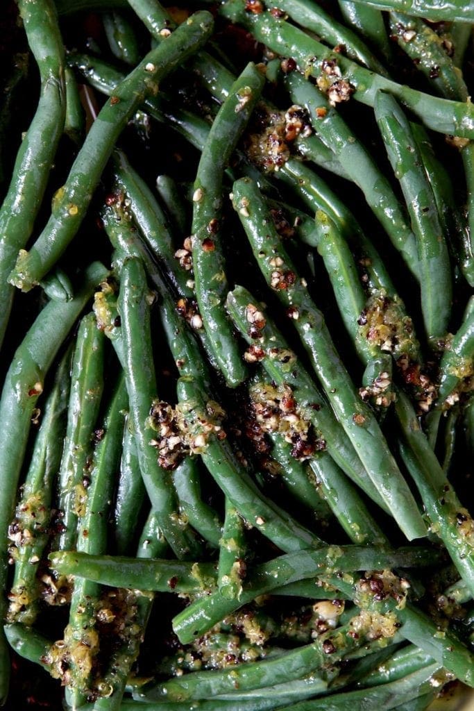 Overhead close up of Lemon Pepper Green Beans with seasoning on top 