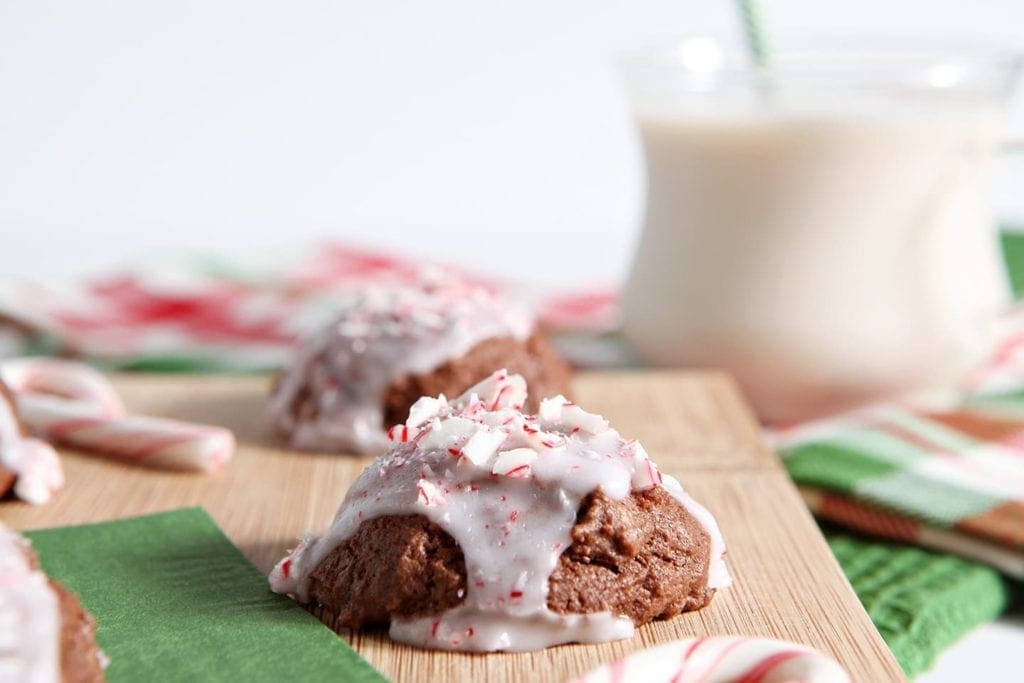 Close up of peppermint brownie drop cookies on wood board 