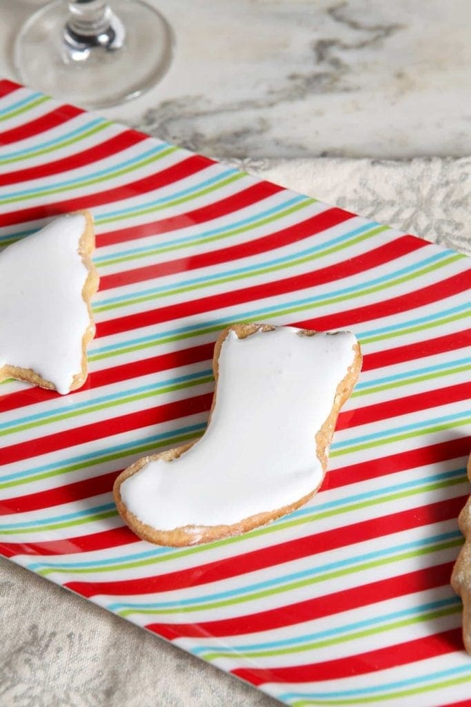 Close up of christmas shaped cookie on christmas platter 