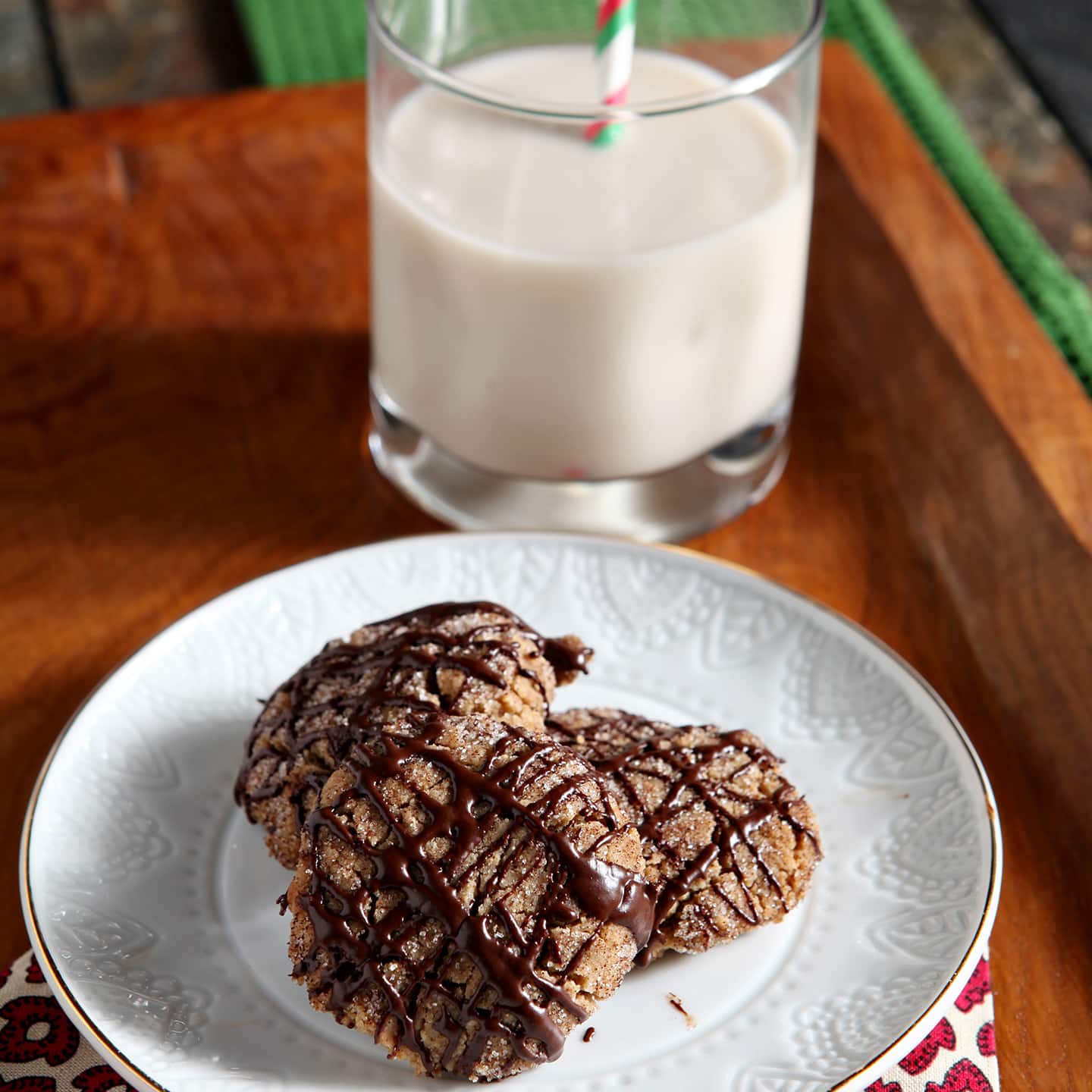 A twist on the classic Peanut Blossom Cookies, these Vegan Peanut Butter Espresso Cookies are rich, crunchy and delicious. Vegan peanut butter and espresso cookies are drizzled with a chocolate espresso glaze that makes the cookies sing!