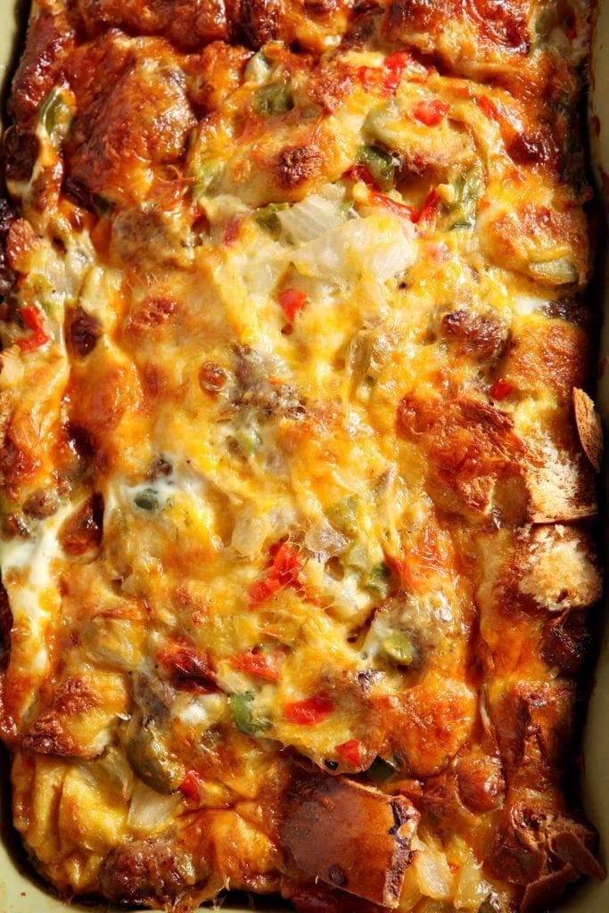 Close up overhead image of a baking dish full of Christmas Breakfast Casserole before serving.