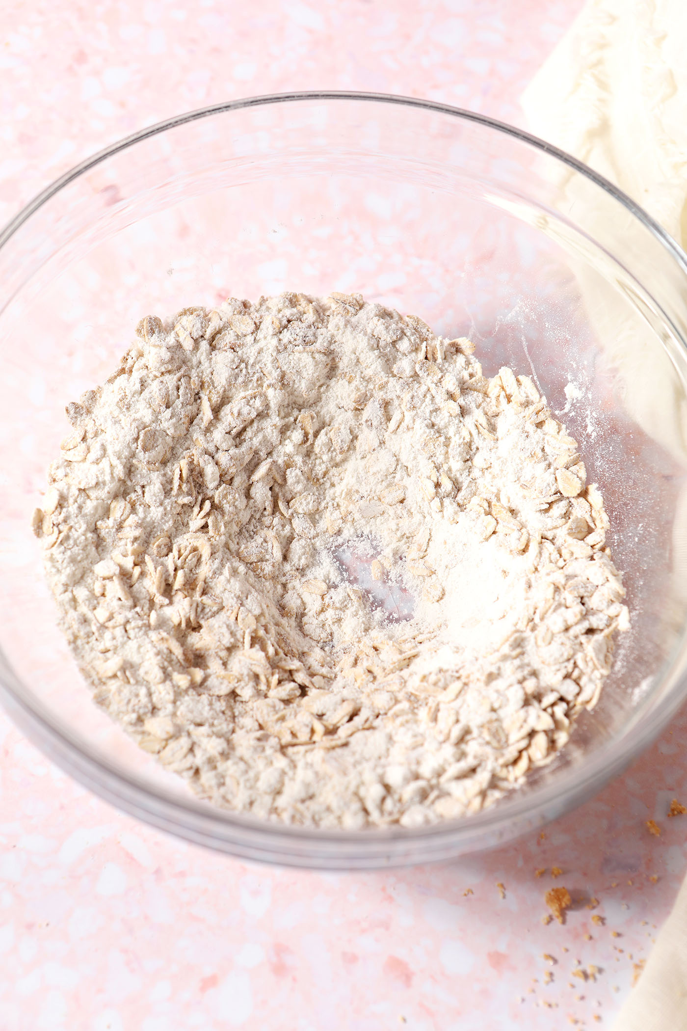 Dry ingredients to make the crumble topping in a glass bowl after mixing