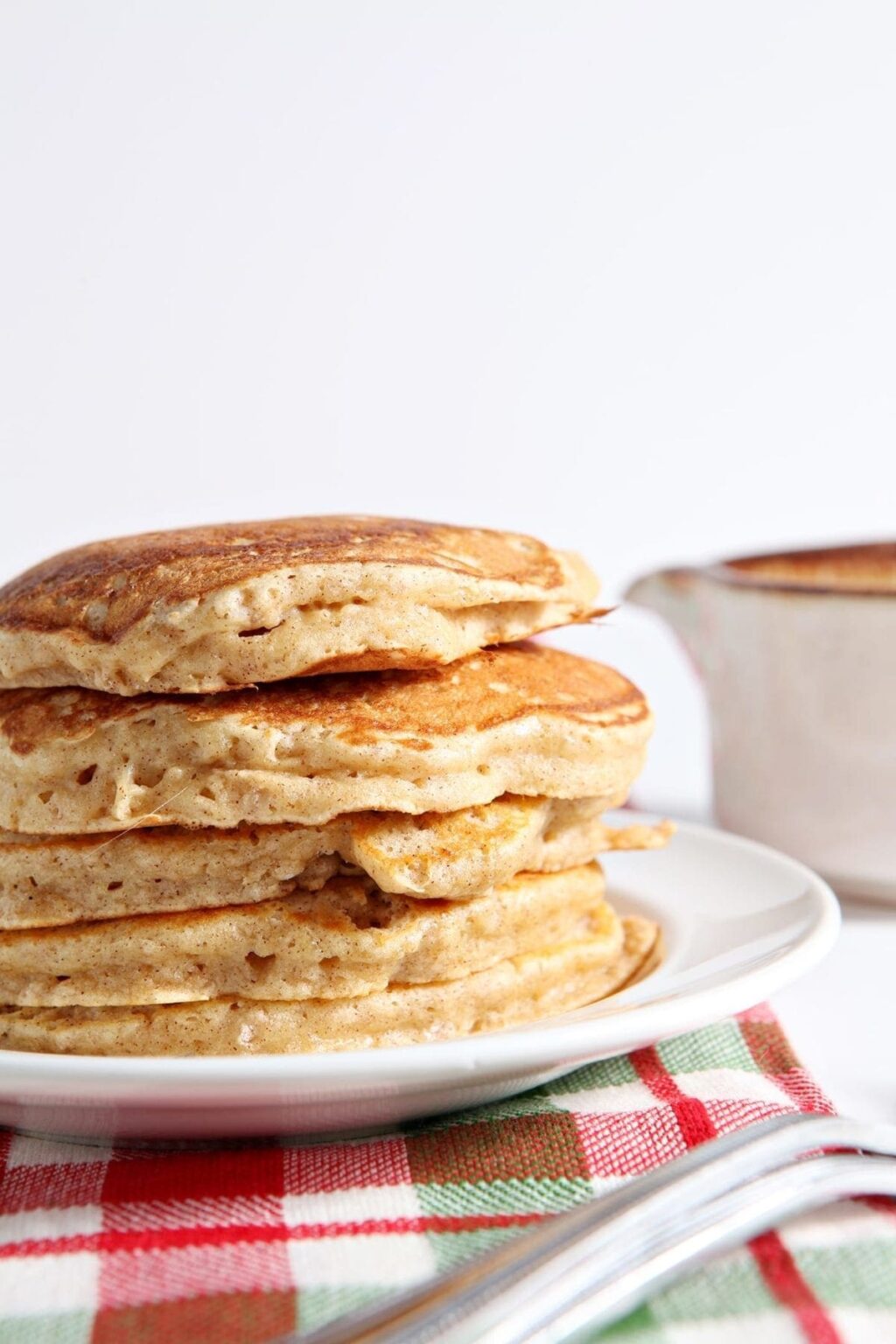 Eggnog Pancakes with Homemade Cinnamon Syrup