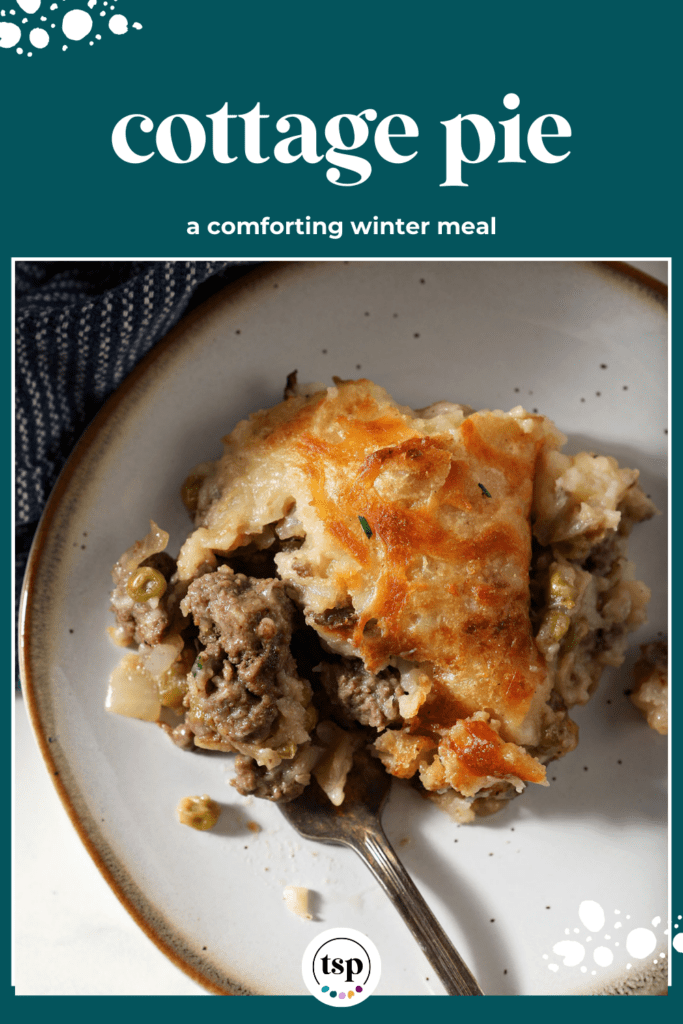 A serving of cheese-covered cottage pie on a plate with a fork with the text cottage pie a comforting winter meal