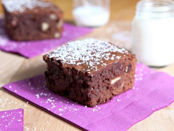Hosting folks for a party this weekend? Bourbon Pecan Brownies are a unique dessert! Dense, chocolate and pecan-filled brownies sing with bourbon flavor and are perfect for a crowd.