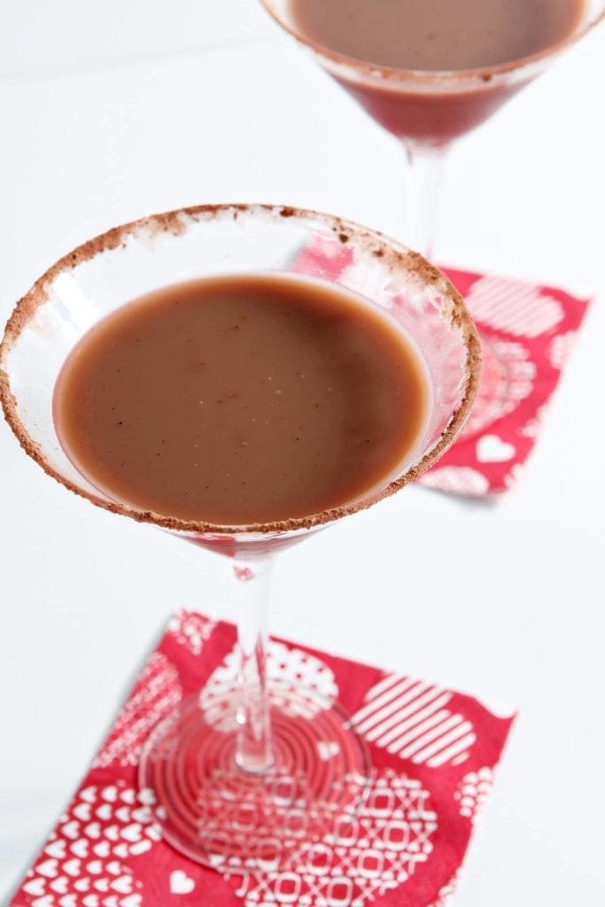 Angled overhead view of vanilla hot chocolate martini in glass 