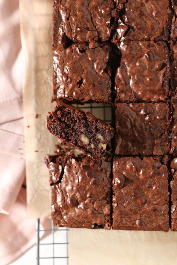 Sliced Brownies with Bourbon and Pecans on a cooling rack