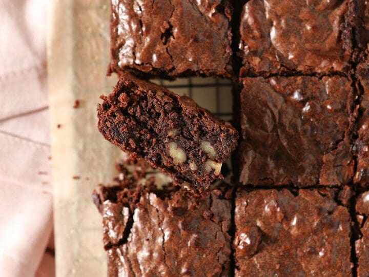Sliced Brownies with Bourbon and Pecans on a cooling rack