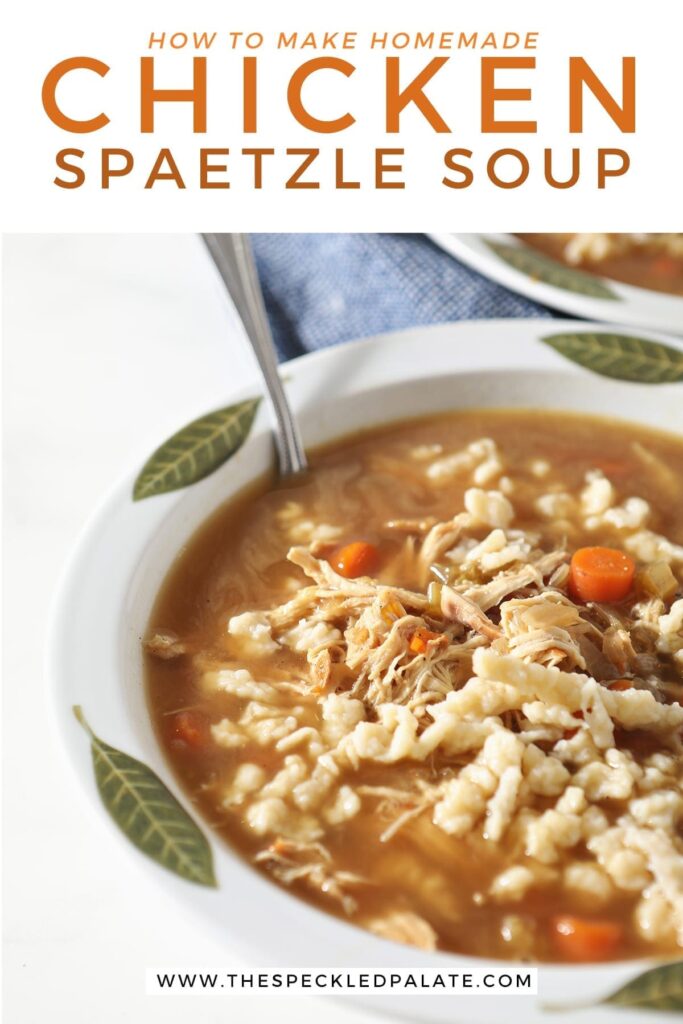 Close up of a bowl of chicken soup with German noodles on marble with a spoon in it with the text 'how to make homemade chicken spaetzle soup'