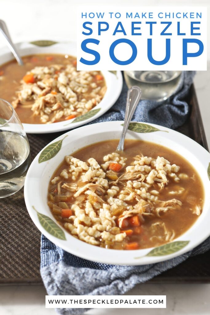 Two white bowls hold chicken spaetzle soup on a metal tray with the text 'how to make chicken spaetzle soup'