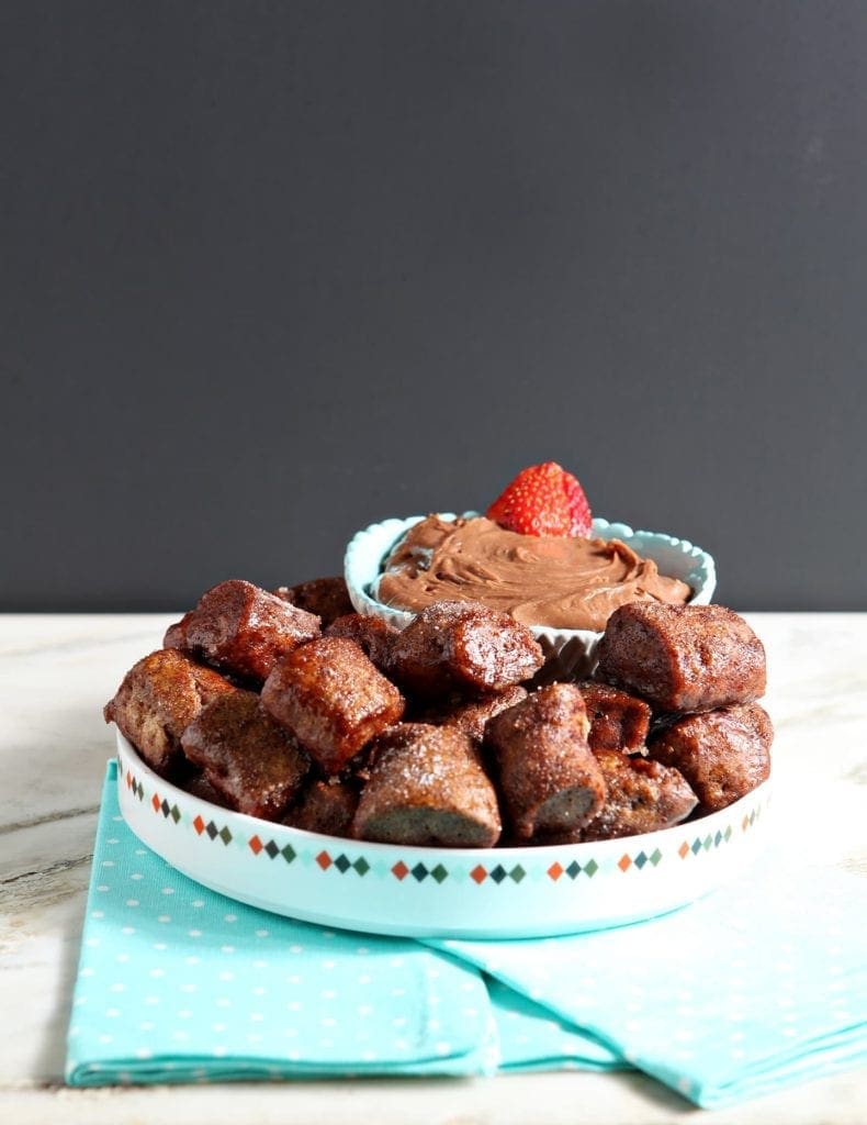 Chocolate Hazelnut Cream Cheese Dip is creamy, chocolate-y and utterly decadent dessert dip! Once the ingredients are blended together, enjoy with Boardwalk Food Company Cinnamon Sugar Pretzels and fresh fruit. This Chocolate Hazelnut Cream Cheese Dip makes a delightful sweet treat to serve at a potluck, party or tailgate. #spon