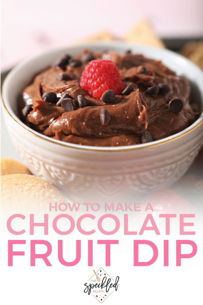 A raspberry sits on top of a bowl of cheesecake dip with the text 'how to make chocolate fruit dip'