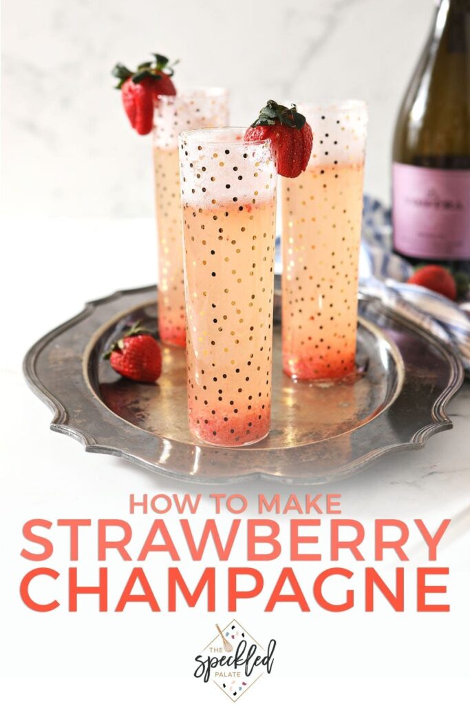 Three flutes holding a pink bubbly drink sit on a silver platter, garnished with fresh strawberries with the text 'how to make strawberry champagne'