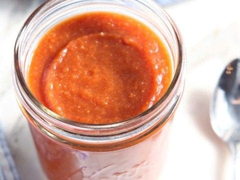 Overhead view of Enchilada Sauce in glass jar 