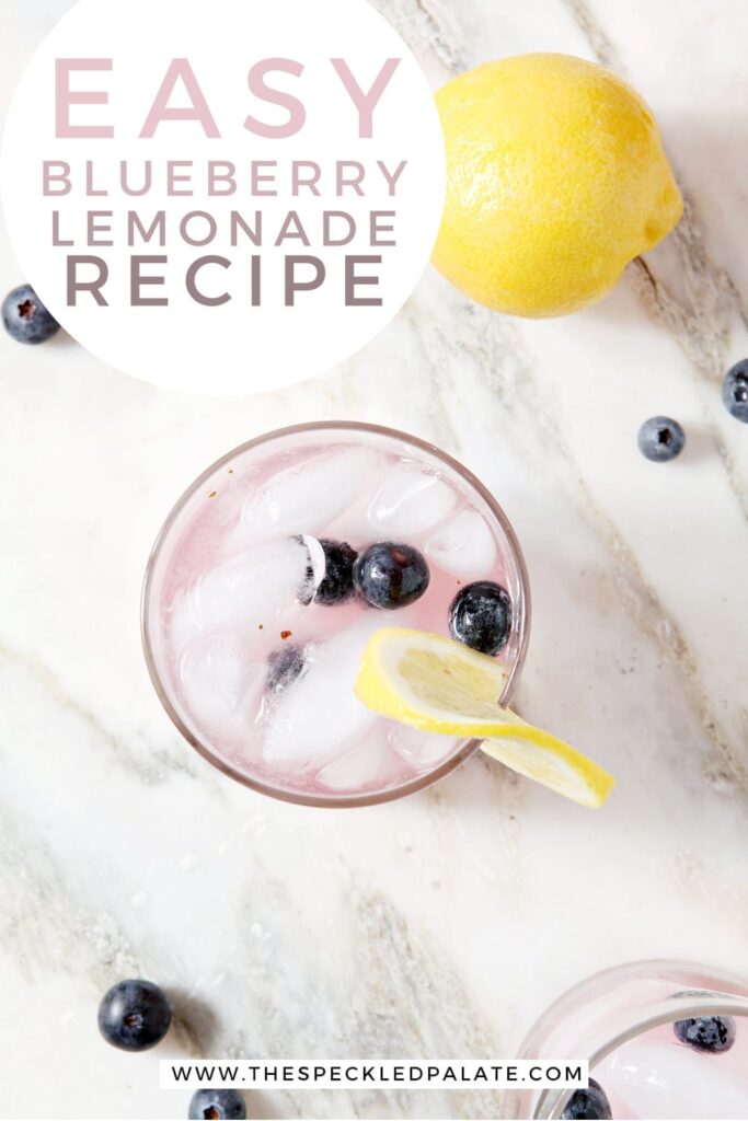 A glass of Blueberry Lemonade from above with Pinterest text