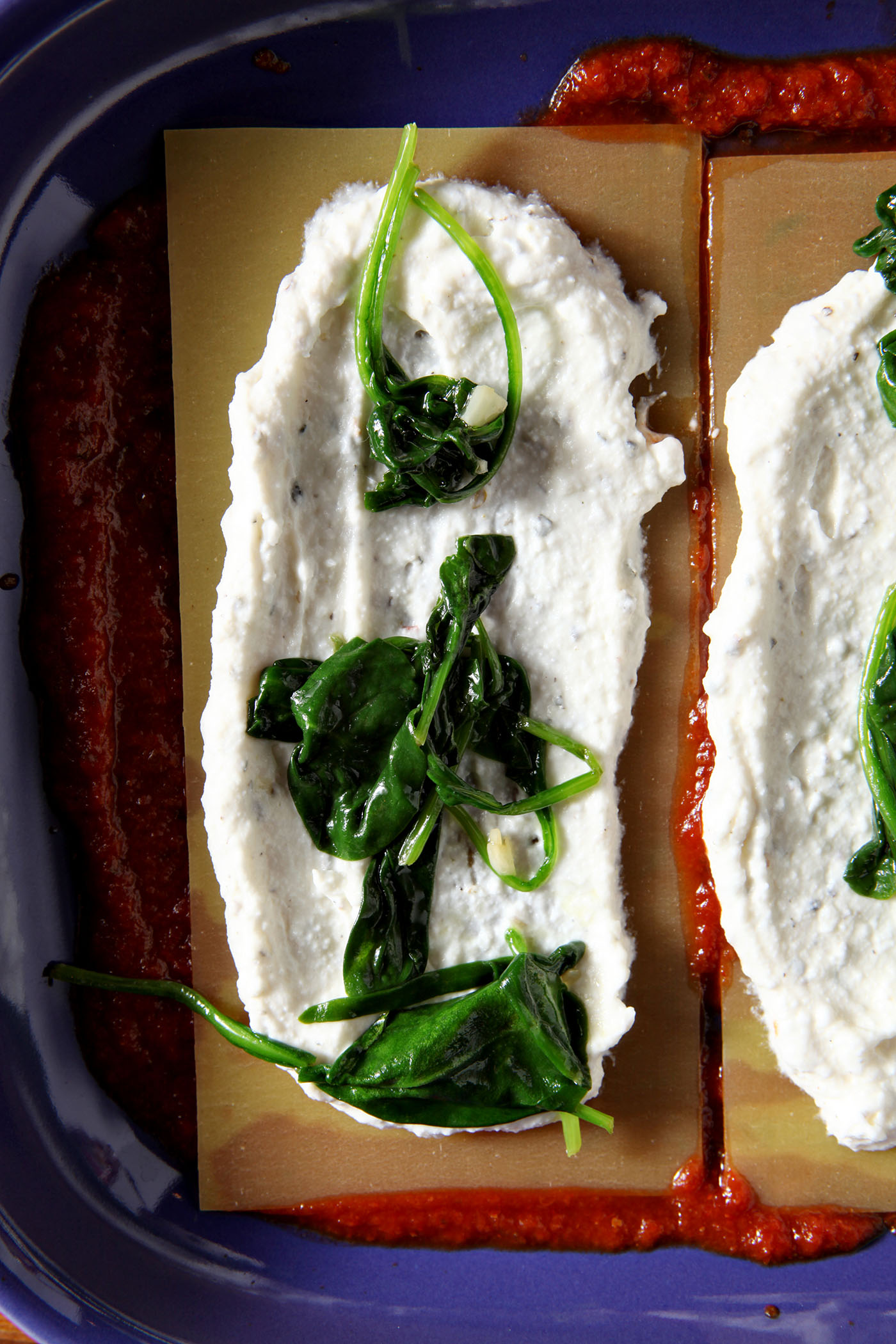 This Spinach Lasagna recipe is a simple, delicious and balanced meal! Calling for store-bought staples and simple ingredients, this is the best kind of comfort food... and it can be made in advance for any evening or occasion.