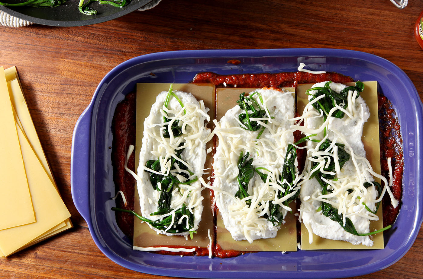 This Spinach Lasagna recipe is a simple, delicious and balanced meal! Calling for store-bought staples and simple ingredients, this is the best kind of comfort food... and it can be made in advance for any evening or occasion.