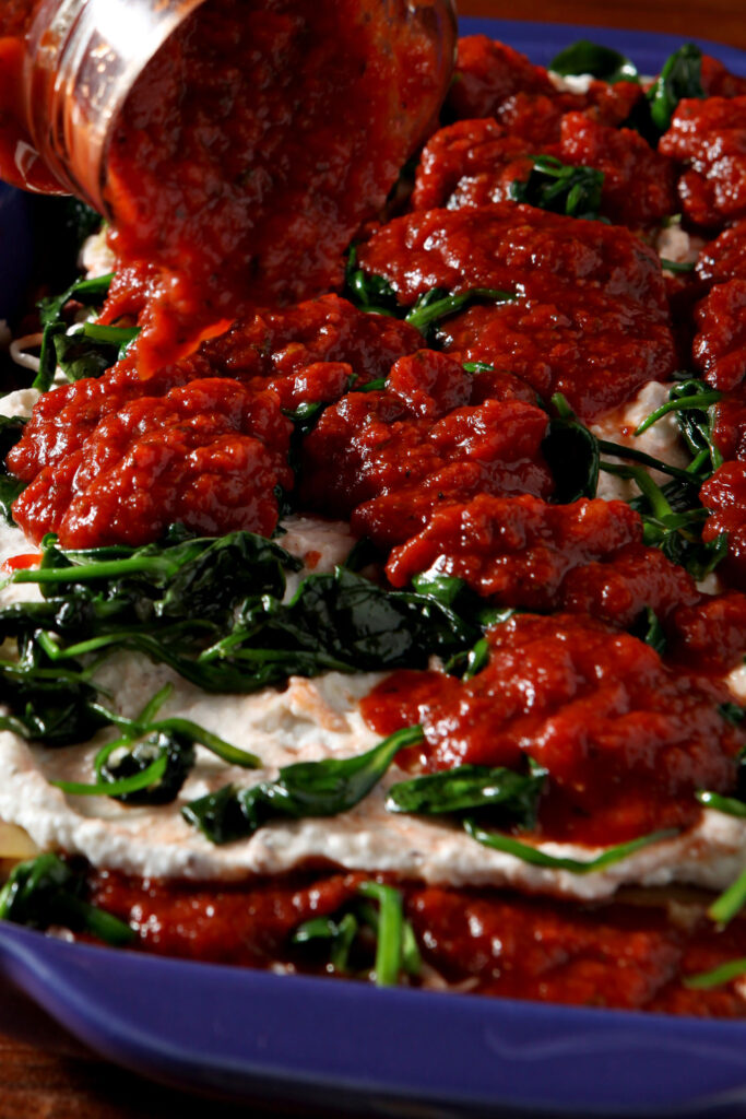 This Spinach Lasagna recipe is a simple, delicious and balanced meal! Calling for store-bought staples and simple ingredients, this is the best kind of comfort food... and it can be made in advance for any evening or occasion.