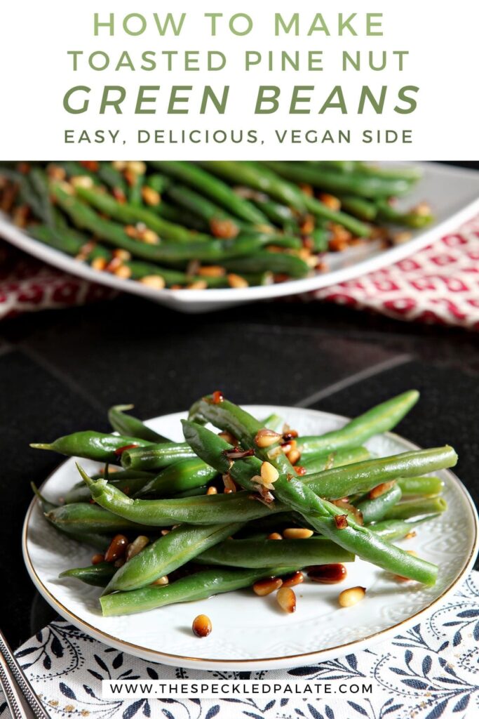 A white plate holds a serving of Vegan Green Beans with Toasted Pine Nuts and shallots with the text 'how to make toasted pine nut green beans. easy, delicious, vegan side'